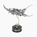 Mecha Ray Natural Metal — unpainted manta with wings spread and the gear train open to view, on a weighted drive base, kinetic sculpture by IFL Watches.