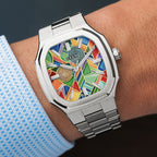 MAEN Manhattan Paradox — hand-painted geometric color-block dial with chevrons, mesh, and two concentric disks on a 37mm octagonal stainless steel case with integrated bracelet, limited edition timepiece by IFL Watches.