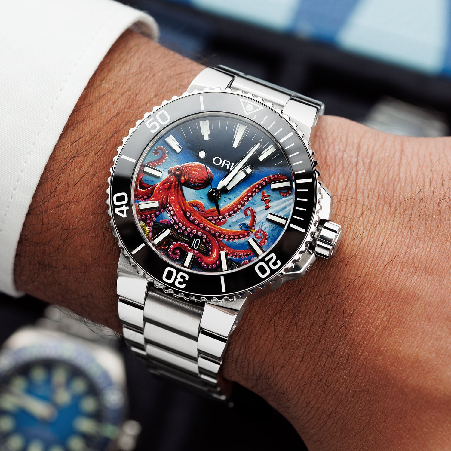 Aquis Octopus Concept – bespoke Oris Aquis dive watch with a hand-painted octopus motif, blue swirling currents, and marine-inspired elements, blending Swiss precision with oceanic beauty. Customized by IFL Watches.