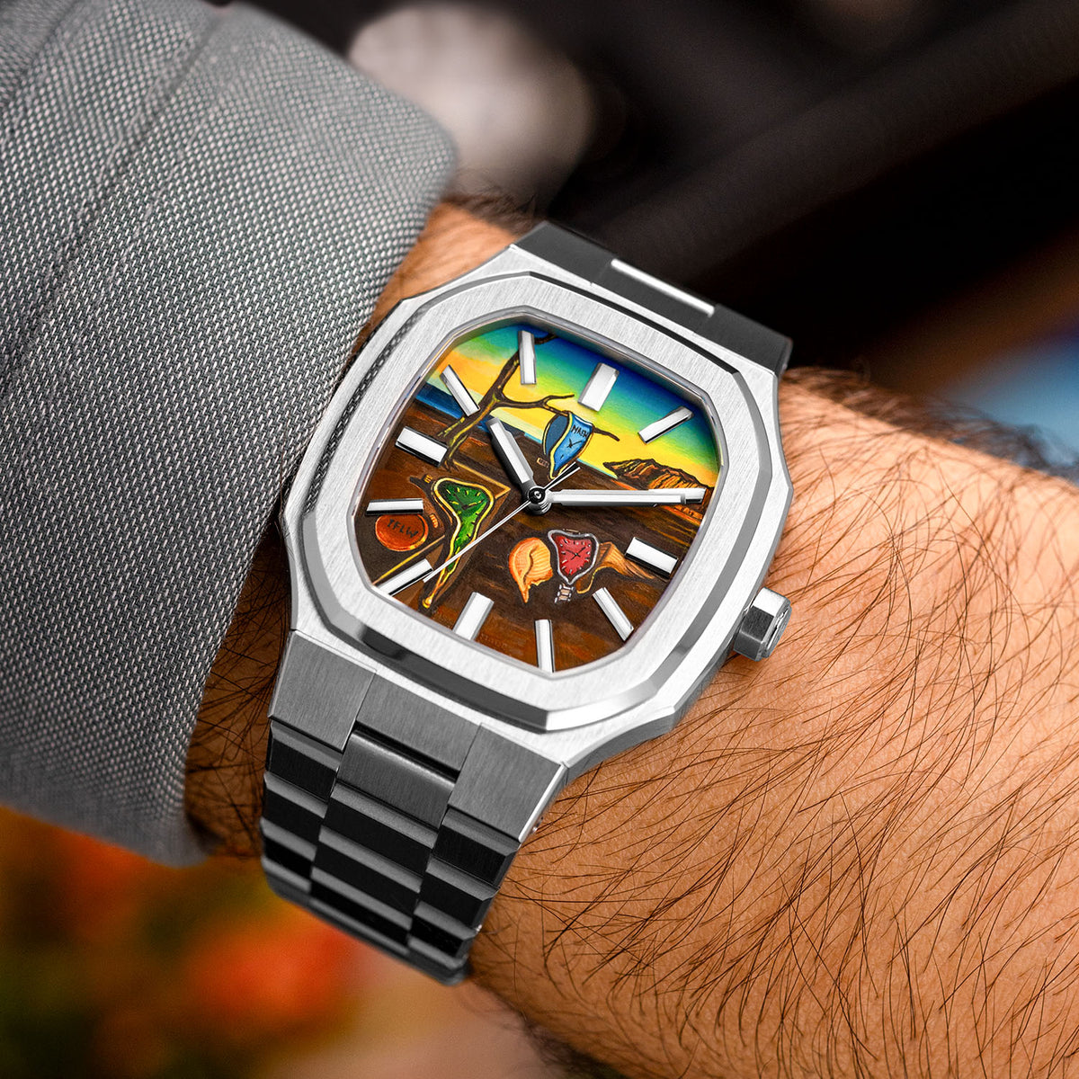 MAEN Manhattan Memento — Angled view on the wrist showing the polished bevels of the octagonal case and the integrated steel bracelet around a hand-painted custom dial, a bespoke timepiece by IFL Watches.