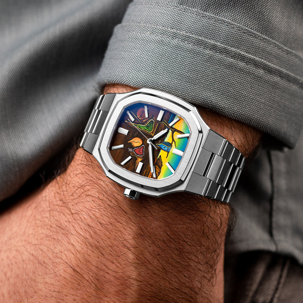 MAEN Manhattan Memento — Worn below a rolled shirt cuff, the hand-painted custom dial set at an angle, its landscape of soft watches framed by the brushed octagonal case and integrated bracelet, customized exclusively by IFL Watches.