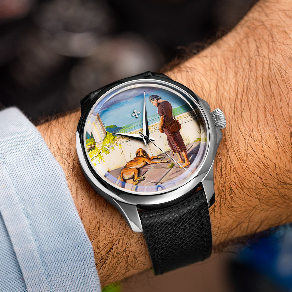 Venezianico Redentore Ulysses & Argus — Tilted view on the wrist, the hand-painted custom dial catching the light as the traveler stands over his resting dog above the sea, a bespoke timepiece by IFL Watches.