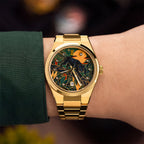 Festina Rive Monarch — Hand-painted custom dial where a black panther crosses an Art Deco landscape in deep emerald beneath an amber moon, crystal-set dot markers around the edge, on a 35mm gold-tone case with fluted bezel and matching bracelet, a bespoke timepiece by IFL Watches.