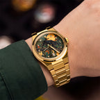 Festina Rive Monarch — Hand-painted custom dial where a black panther crosses an Art Deco landscape in deep emerald beneath an amber moon, crystal-set dot markers around the edge, on a 35mm gold-tone case with fluted bezel and matching bracelet, a bespoke timepiece by IFL Watches.