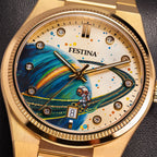 Festina Rive Space Ollie — Close detail of the hand-painted dial where an astronaut rides a board along the ring of a blue and green planet, beside crystal-set markers and a fluted gold bezel, bespoke by IFL Watches.