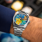 Dream Team Concept — Hand-painted bespoke timepiece featuring four colorful pop art figures rendered in glittering mosaic-tile style on a deep blue 41mm custom automatic dial by IFL Watches