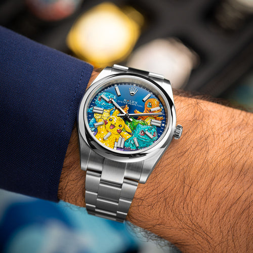 Dream Team Concept — Hand-painted bespoke timepiece featuring four colorful pop art figures rendered in glittering mosaic-tile style on a deep blue 41mm custom automatic dial by IFL Watches