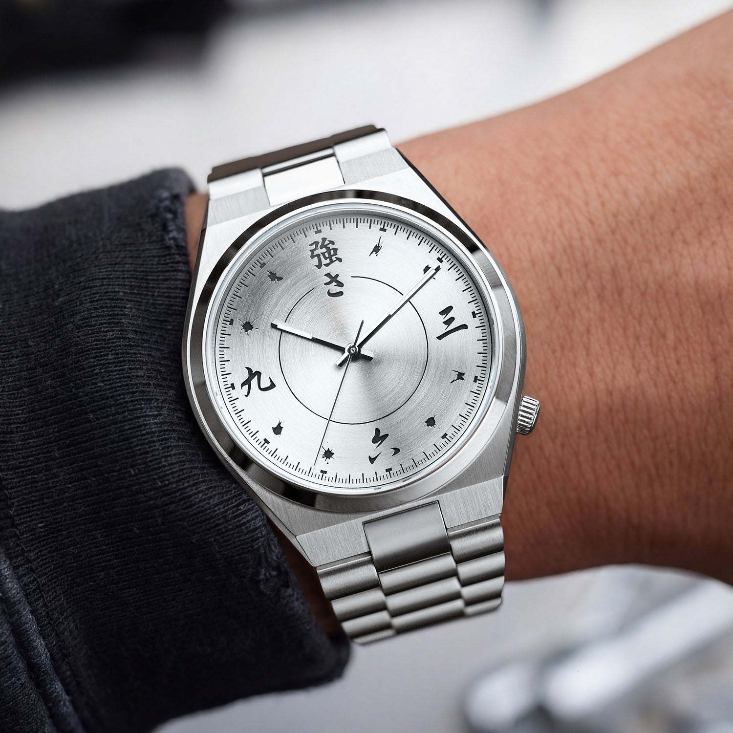 Citizen Tsuyosa Kanji on wrist — Japanese numeral indices rendered in black ink on the silver dial, worn against a dark sleeve on a stainless steel case with matching bracelet, a custom timepiece by IFL Watches.