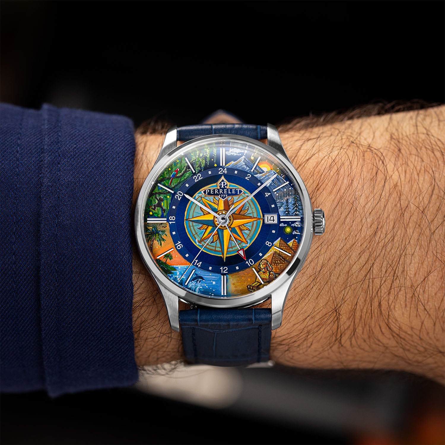 Perrelet Weekend GMT Atlas on the wrist with its blue leather strap — the hand-painted compass dial worn with a navy sleeve, limited edition timepiece by IFL Watches.