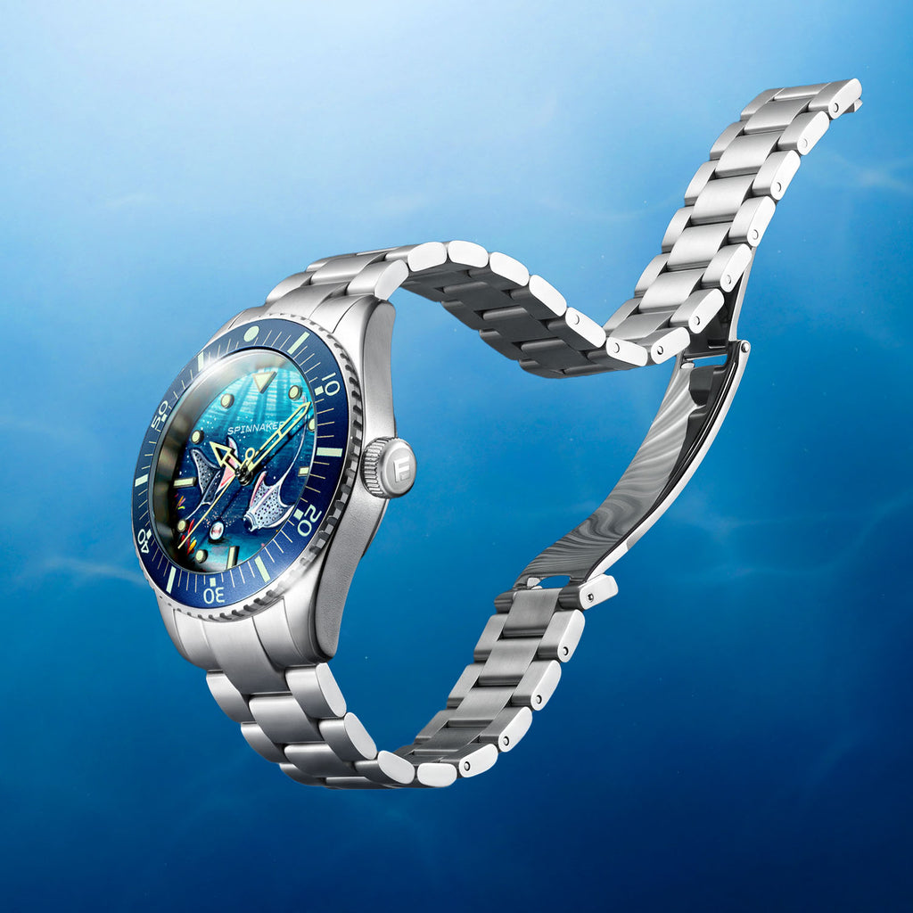 Spinnaker Spence Underwater Dancers — The watch and its steel bracelet suspended against open water, customized dial catching light, limited edition timepiece by IFL Watches.