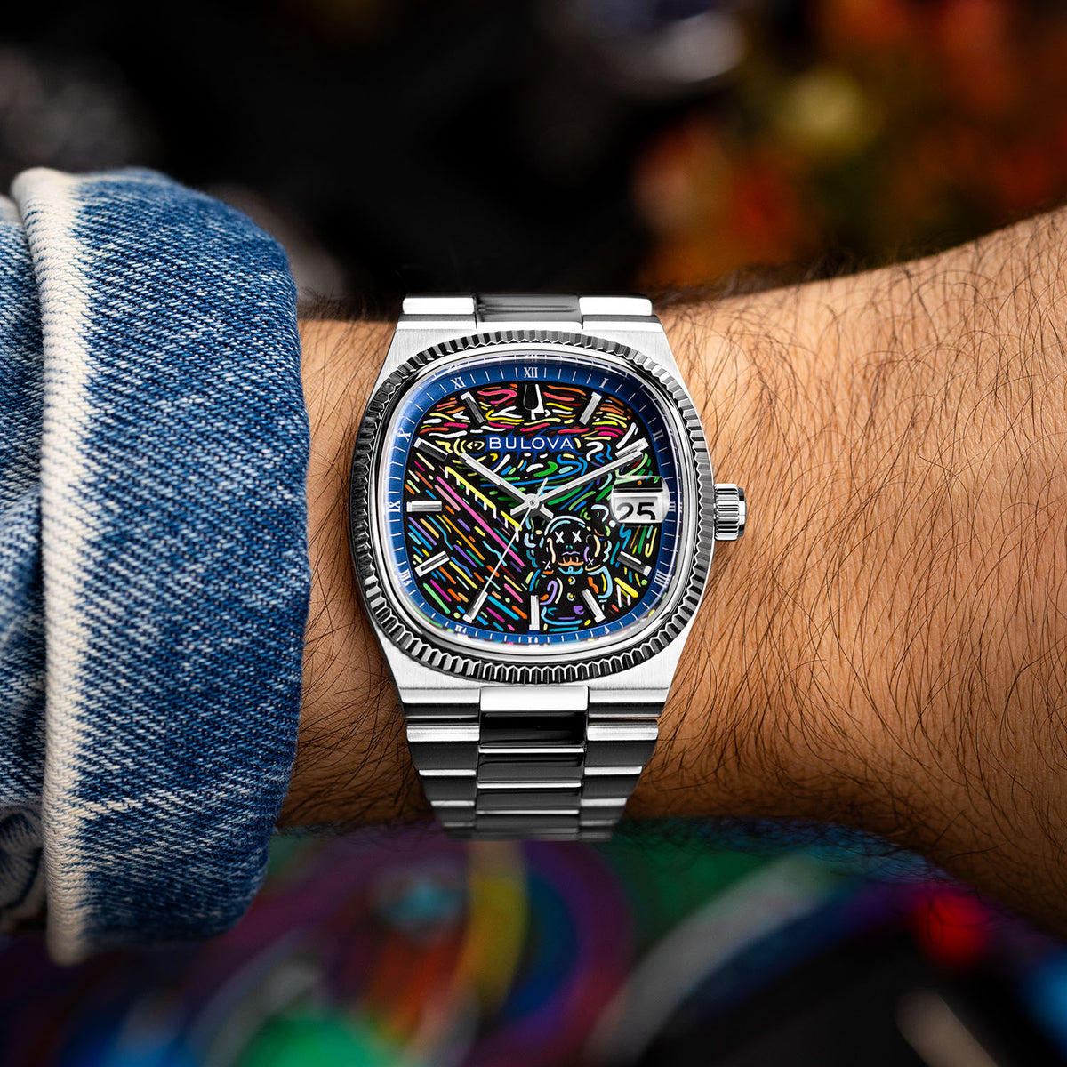 Bulova Super Seville Scream — Worn below a rolled denim cuff, the neon strokes and screaming figure square to the camera, custom limited edition by IFL Watches