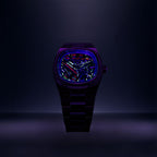 Bulova Super Seville Scream — Standing upright in a darkened studio under UV light, the neon strokes and the figure's outline glowing across the dial, limited edition timepiece by IFL Watches
