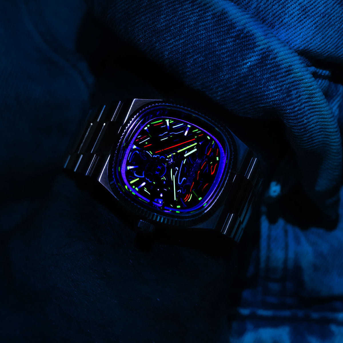 Bulova Super Seville Scream — On the wrist under UV light, neon strokes lighting up across the darkened dial, customized limited edition by IFL Watches