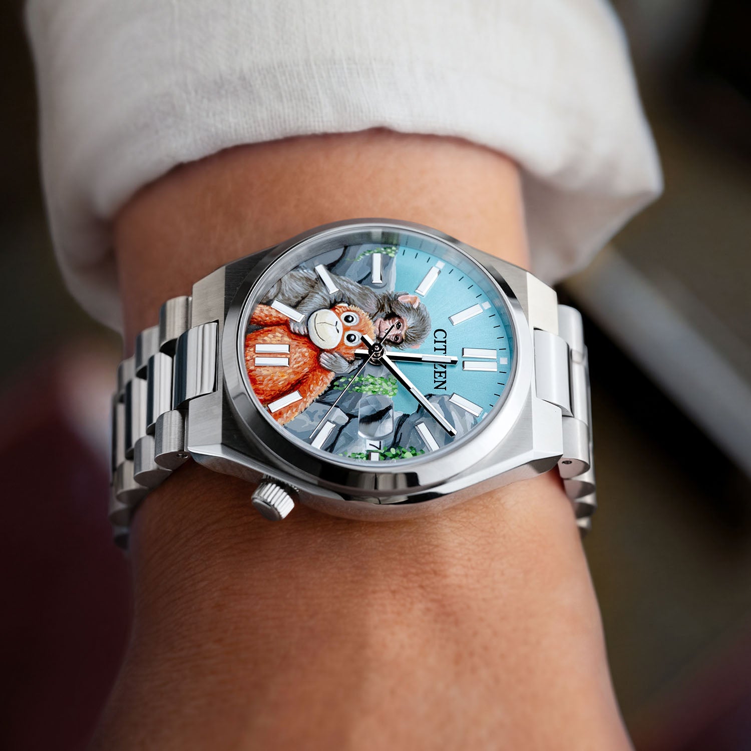 Citizen Tsuyosa Punch — Hand-painted custom Citizen Tsuyosa Automatic featuring a baby snow monkey holding his orange stuffed orangutan plushie inspired by the true story of Punch from Ichikawa City Zoo, a bespoke timepiece by IFL Watches