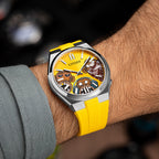 Citizen Tsuyosa Strap – Yellow FKM strap shown at an angle on the wrist with the hand-painted Wise Guys Concept by IFL Watches