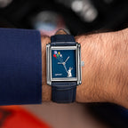Laphont Bloc Skybound — Seen straight on at the wrist, the navy cuff pushed back from the stepped steel case as the kites climb across the dial, a custom limited edition watch by IFL Watches