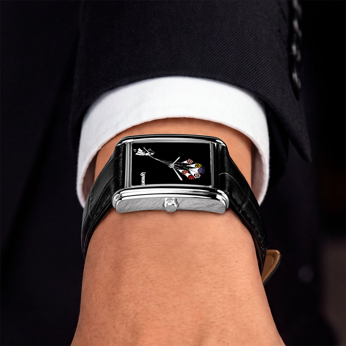 Laphont Bloc Bouquella — Side view on the wrist from the crown, showing the slim profile of the stepped steel case beneath a white cuff, a hand-painted limited edition watch by IFL Watches