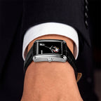 Laphont Bloc Bouquella — Side view on the wrist from the crown, showing the slim profile of the stepped steel case beneath a white cuff, a hand-painted limited edition watch by IFL Watches