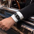 Laphont Bloc Bouquella — On the wrist at an open car window, a wooden steering wheel behind, the black dial and croc-embossed strap framed by a crisp white cuff, a limited edition custom timepiece by IFL Watches