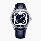 Mandetbrote Orbital II Blue — Front view of the blue aventurine glass dial with cushion-shaped hour rail, geared satellite and central minute hand, 40mm steel case on blue leather strap, available at IFL Watches.