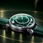 Mandetbrote Orbital II Green — Low side view on a gold-ringed surface, showing the case profile and coin-edge caseback, available at IFL Watches.