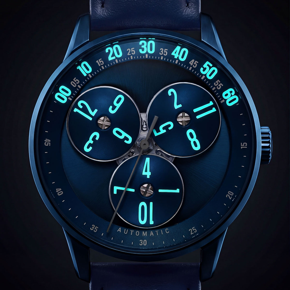 Mandetbrote Wandering Hour Dark Blue — In the dark, with the hour numerals and minute track glowing, available at IFL Watches.