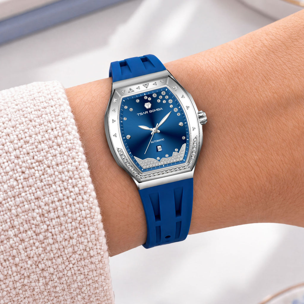 Tsar Bomba Lumina Blue — Worn on wrist at an angle, showing the crown and bezel stones, available at IFL Watches.