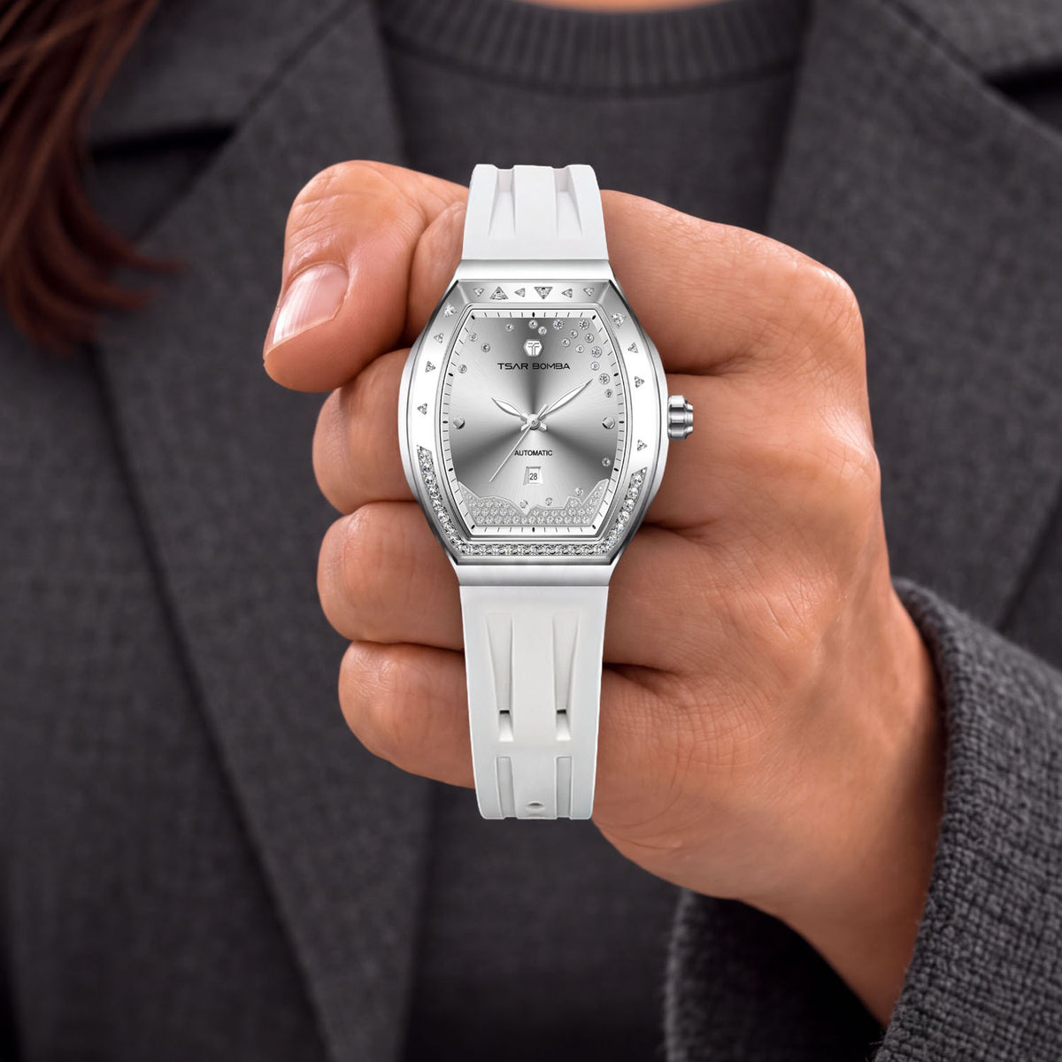 Tsar Bomba Lumina White Silver — Held in hand, showing the diamond-set bezel, available at IFL Watches.