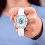 Tsar Bomba Nucleus Femme 02 White Blue — Held in hand, showing the transparent case and rose-gold screws, available at IFL Watches.