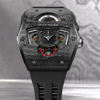 Tsar Bomba Parallax Carbon Black — Front close-up against a dark textured backdrop, showing the day, month and 24-hour displays, available at IFL Watches.