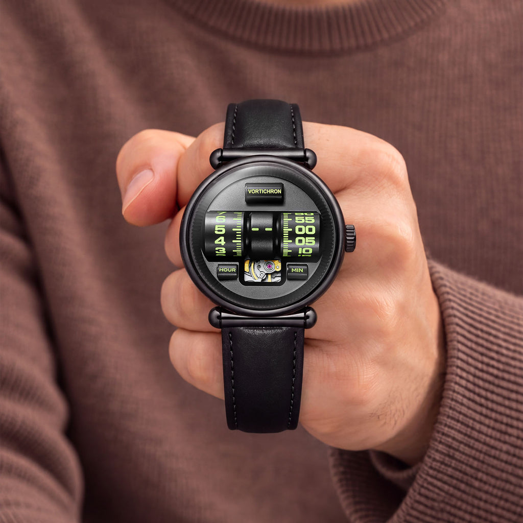 Vortichron Double Roller Midnight Black — Held in hand against a brown knit sweater, showing the two numbered rollers, available at IFL Watches.