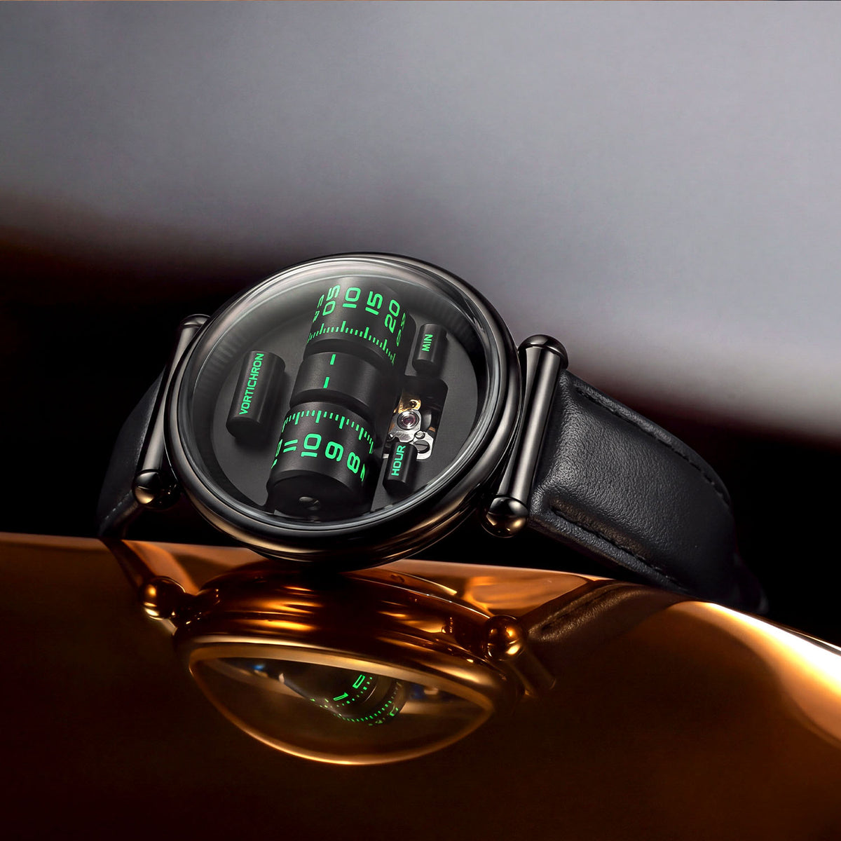 Vortichron Double Roller Midnight Black — Angled on a reflective gold surface, showing the rollers and balance window, available at IFL Watches.