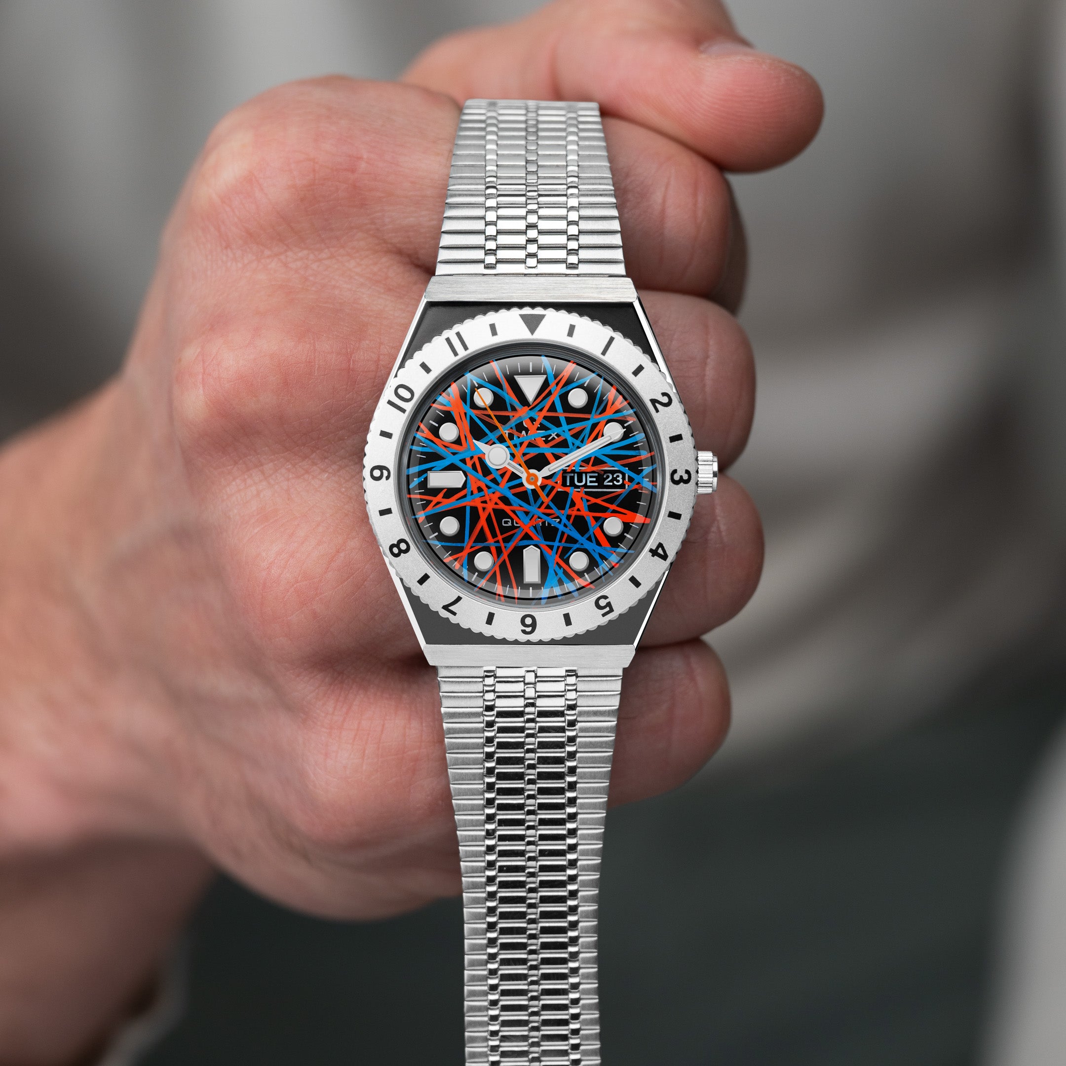 Timex Q Neon – Exclusive hand-painted timepiece with vibrant Blue and Orange Abstract Dial Artwork from Timex Q Diver Custom Collection